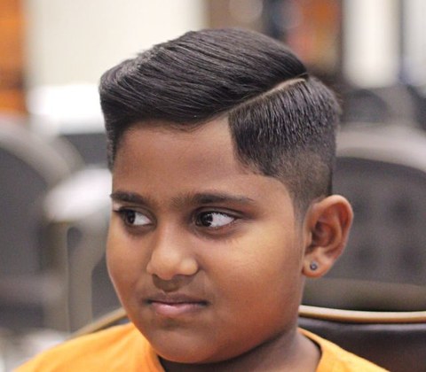 Boy's haircut inspiration with side part